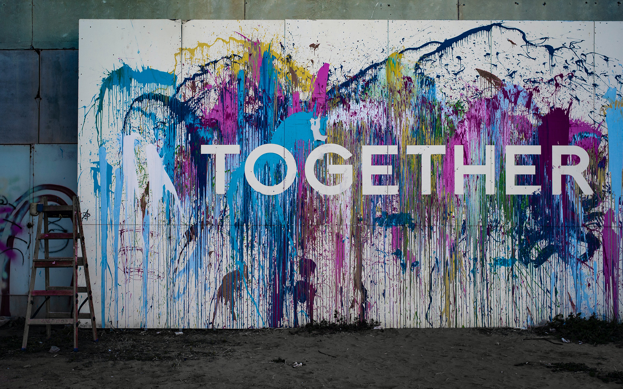 Together, written on a mural.